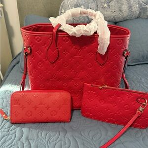 Designer LOOK RED embossed bag with matching pouch and zip around wallet.